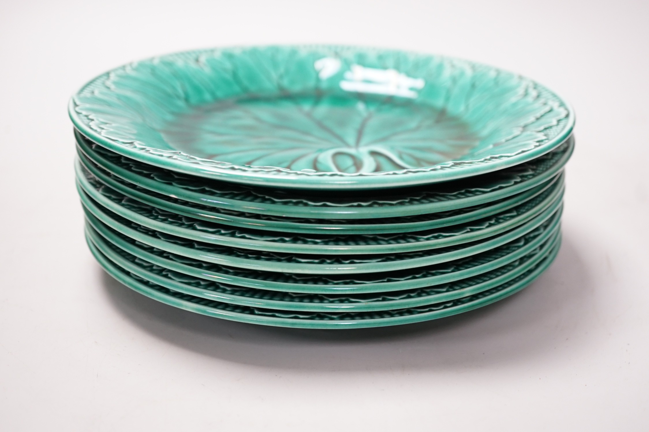 A set of eight Wedgwood cabbage leaf plates, 20cm